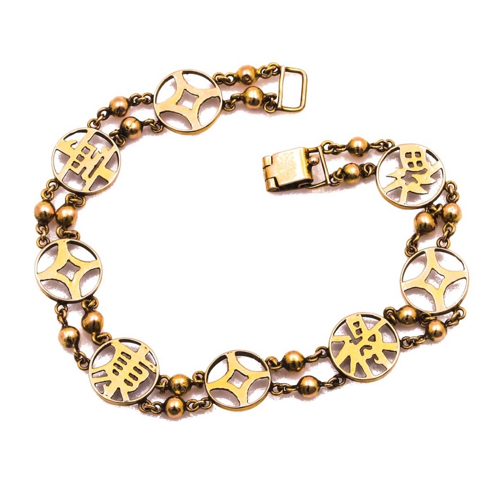 14K yellow gold Chinese character bracelet.